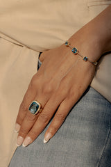 The Grande Blue Topaz Halo Ring